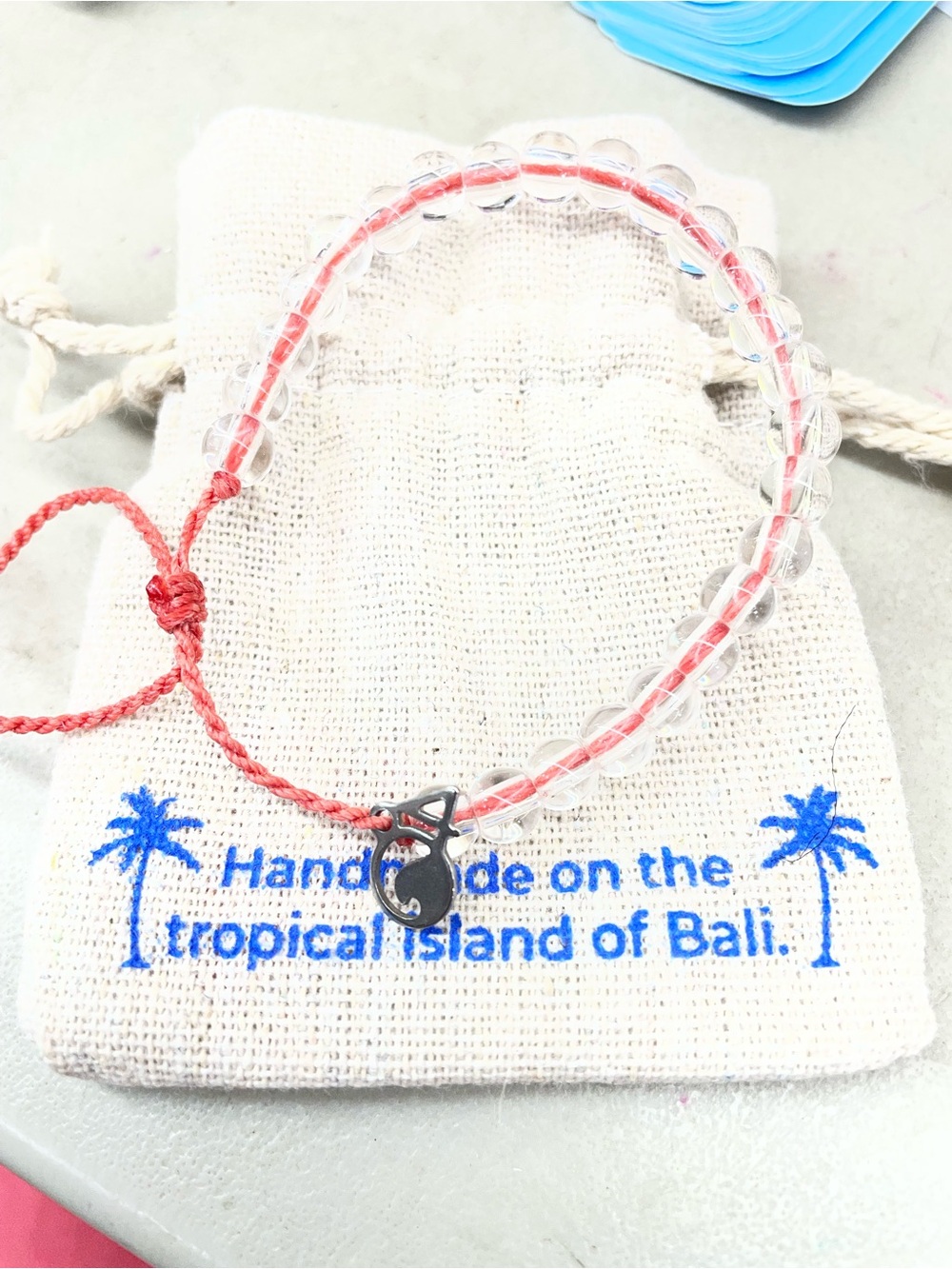 Handmade Clear Bead Bracelet with Coral Cord and Silver Charm